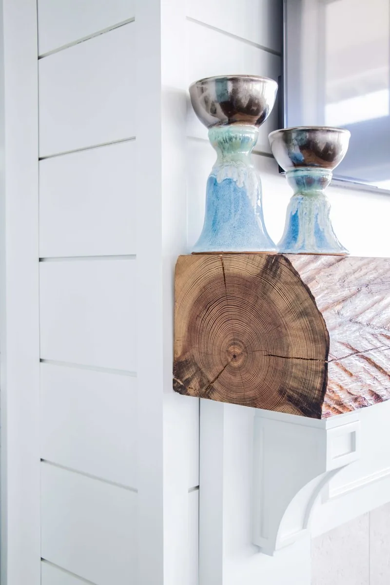 A built-in corner shelf with a live edge wood bracket